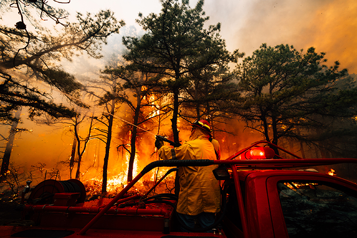 Firefighters battle the Jones Road Wildfire in Ocean County (photo courtesy New Jersey Department of Environmental Protection). Firefighters battle the Jones Road Wildfire in Ocean County (photo courtesy of the New Jersey Department of Environmental Protection).