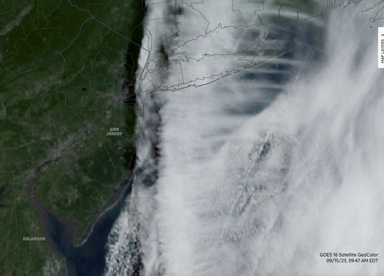 NOAA GOES visible image at 9:47 AM EDT on September 15 showing the western periphery of Hurricane Lee and the shadow being cast just to the west of the cloud line over eastern NJ.