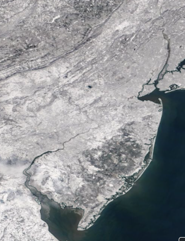 NASA MODIS visible satellite image showing snow cover across New Jersey and surrounding states on the morning of January 30th.