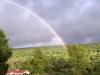 A rainbow (note a slight double rainbow) early on the evening of May 15th, looking east from Shawnee, PA, across the Delaware River with the NJ Kittatinny Ridge in the background (photo courtesy of Erin Daly).