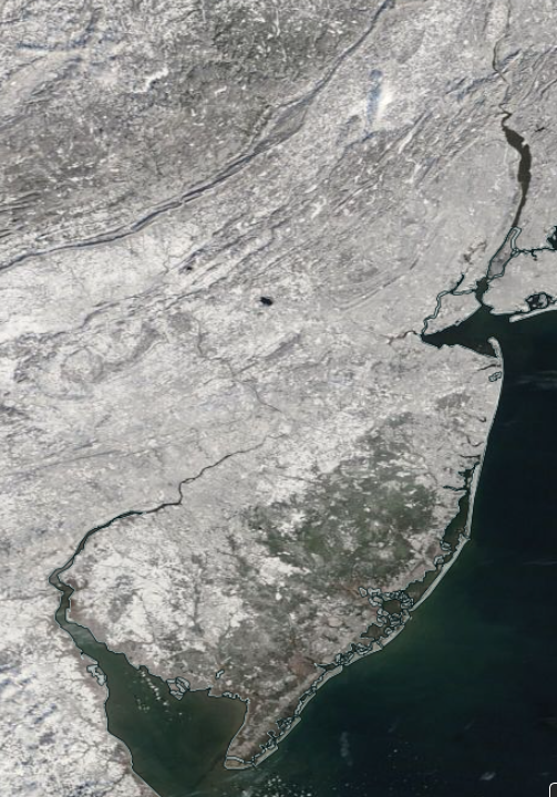 NASA MODIS visible satellite image on the morning of January 20th showing snow cover over New Jersey and surrounding states.